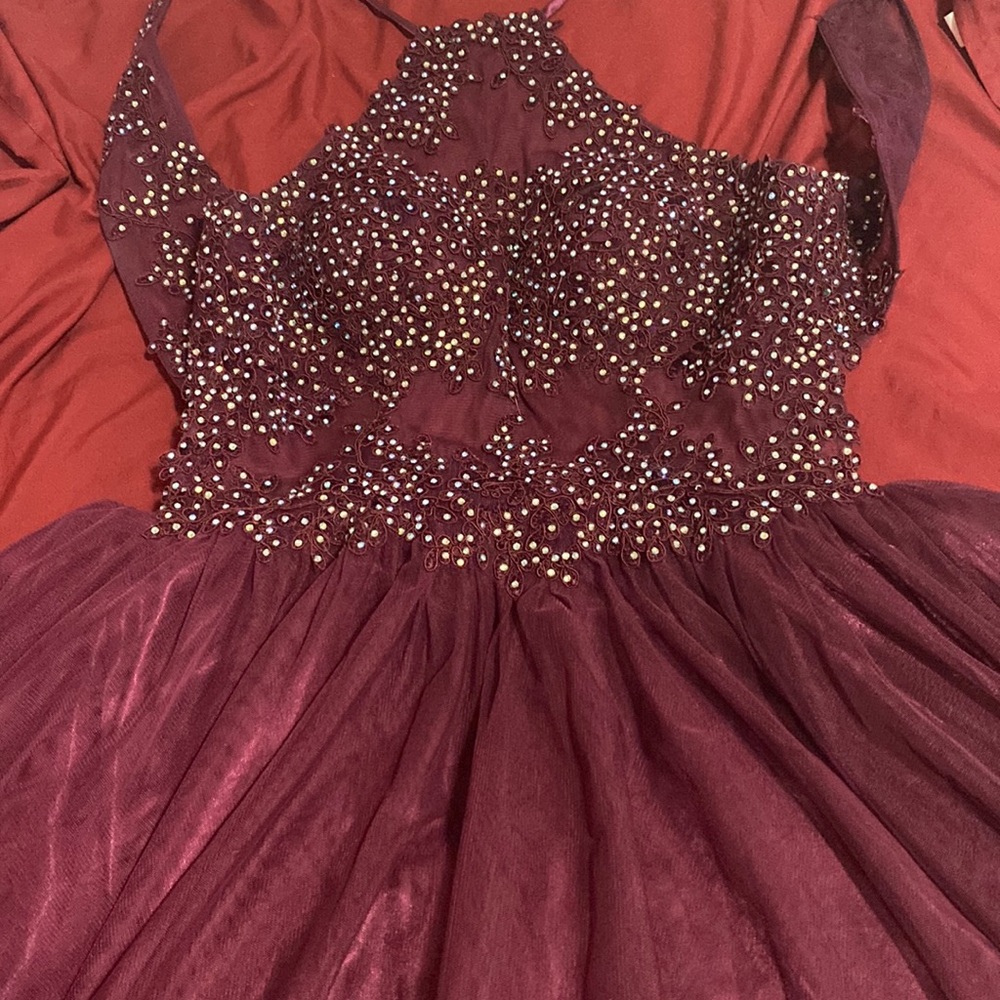 Burgundy homecoming beaded dress. Worn once, size 3.